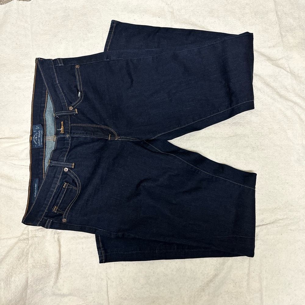 Lucky Brand Jeans. Charlie Skinny. Dark denim wash. Sizing 12/31